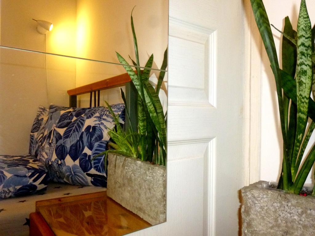 Quarto Triplo com Banheiro Compartilhado
